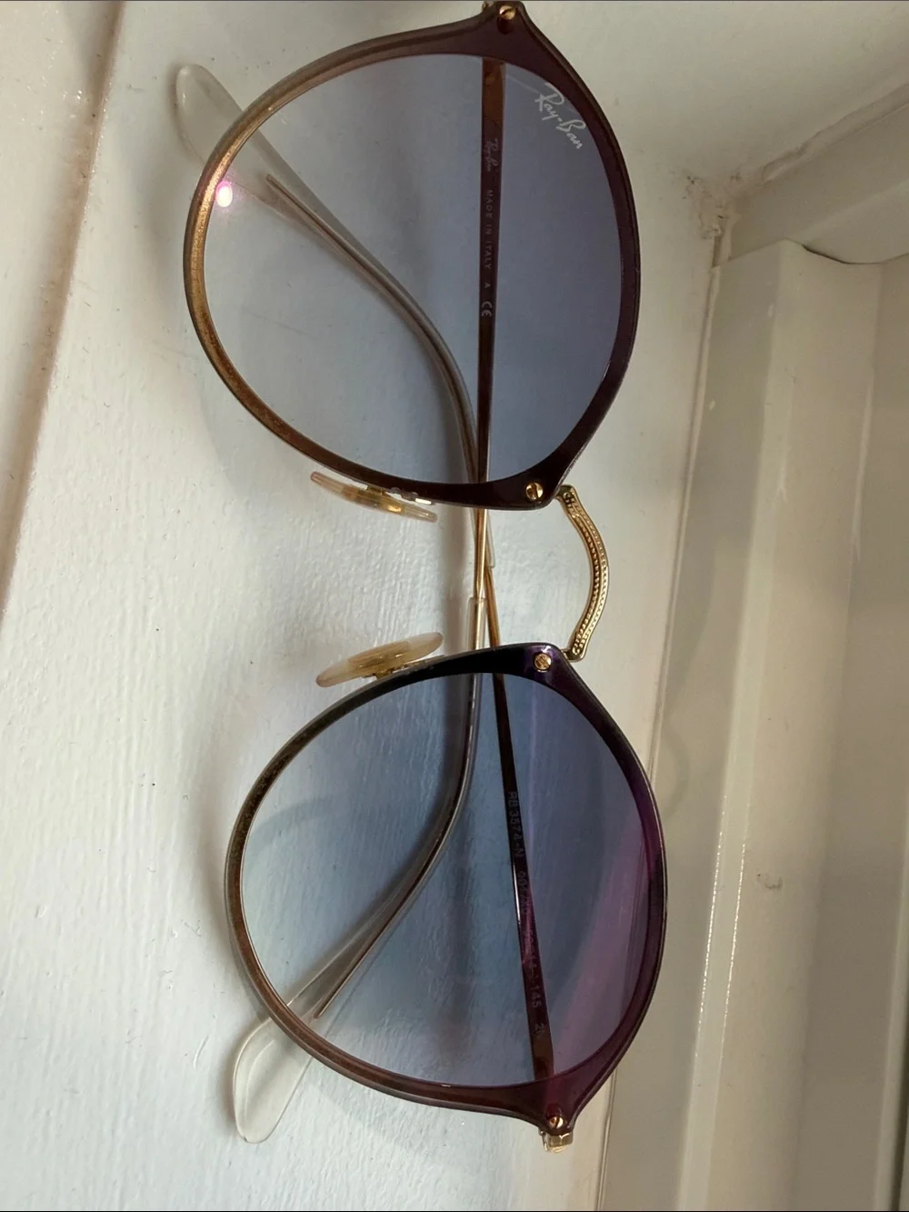 Ray-Ban gold hidden Frame Sunglasses with Blue Lenses